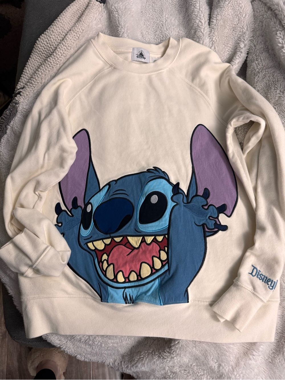 Disney Cream Sweatshirt with Blue Stitch Graphic
